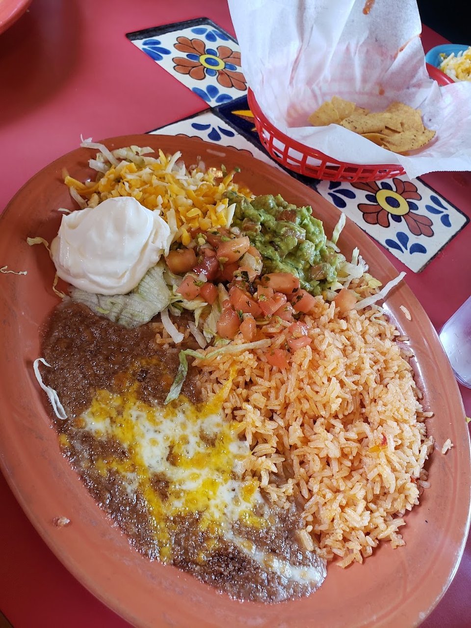 Menu page listing tacos, tostadas, and house specials.