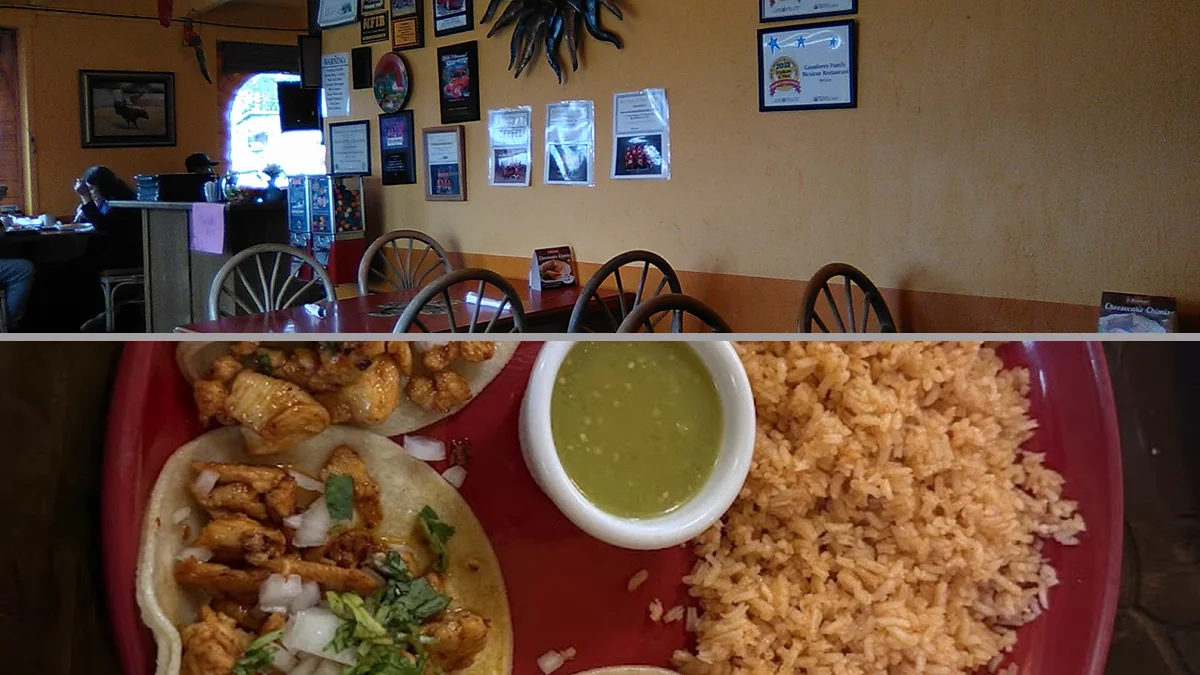 Casual Mexican restaurant dining room with simple tables.