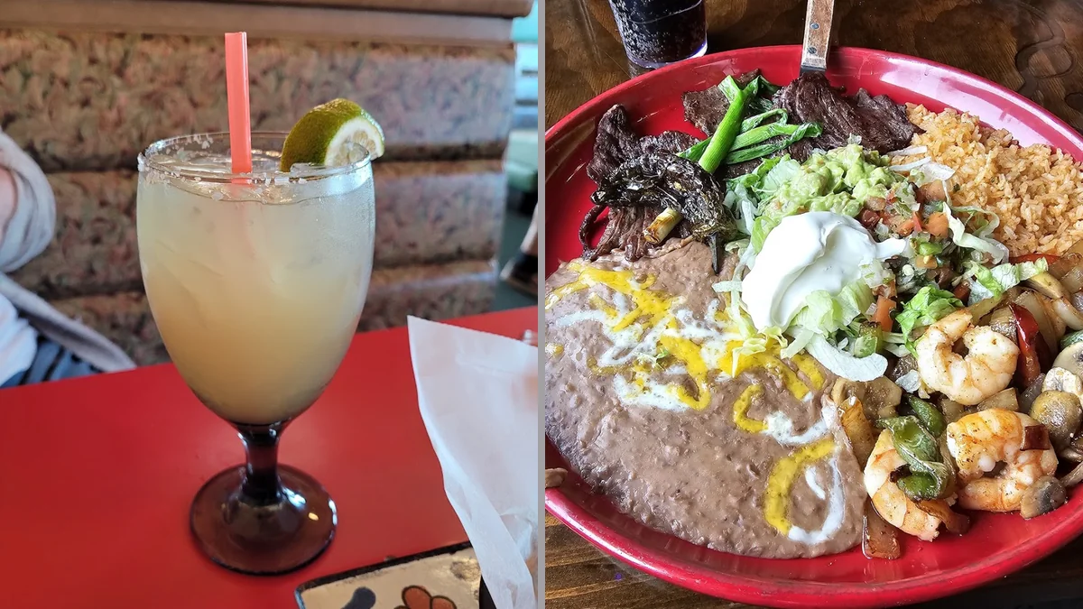 Plates of burritos and tacos on a table.